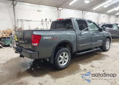 2009 Nissan Titan Pro-4X z USA, uszkodzony, nr VIN 1N6BA07C09N306361